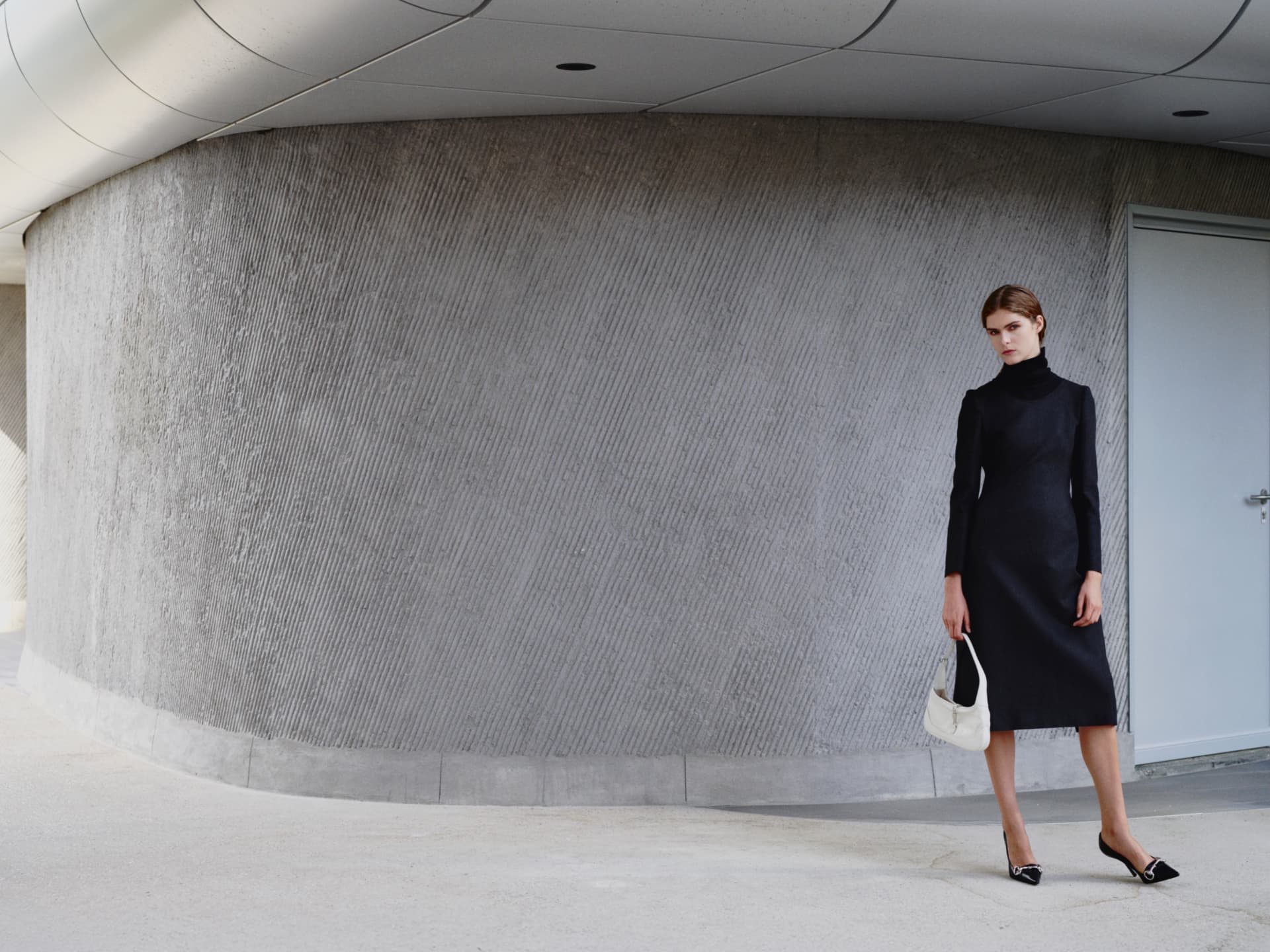 My Magazine Issue 18 — figure in a black dress against a curved concrete wall